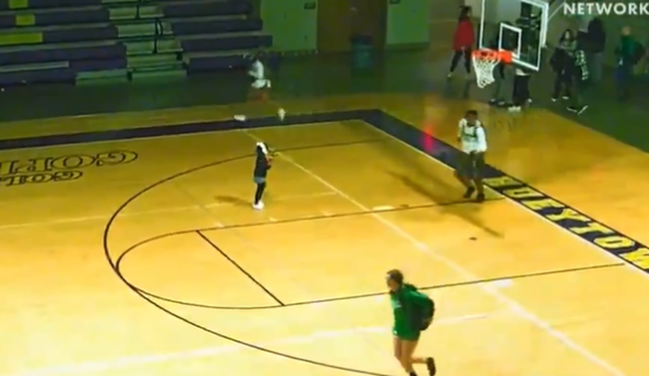 Featured image for Chaos Erupts: Woman Charged with Attempted Murder in High School Basketball Game Shooting