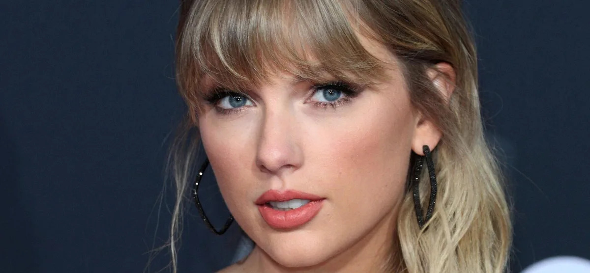 Featured image for "Taylor Swift's Alleged Grammy After-Party Vodka Chugging Sparks Controversy"