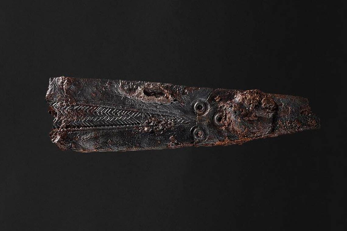 "Unearthing an Ancient Inscribed Blade: Deciphering its Enigmatic Message"