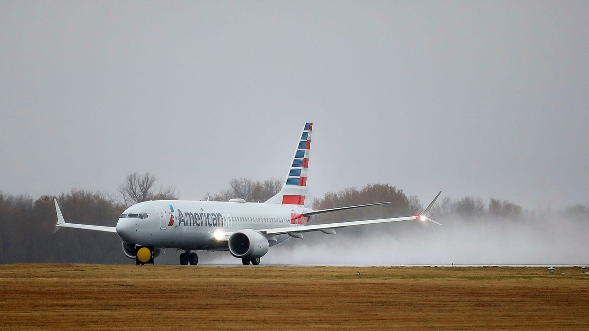 Featured image for "Unruly Passenger Restrained After Attempting to Open Plane Door on American Airlines Flight"