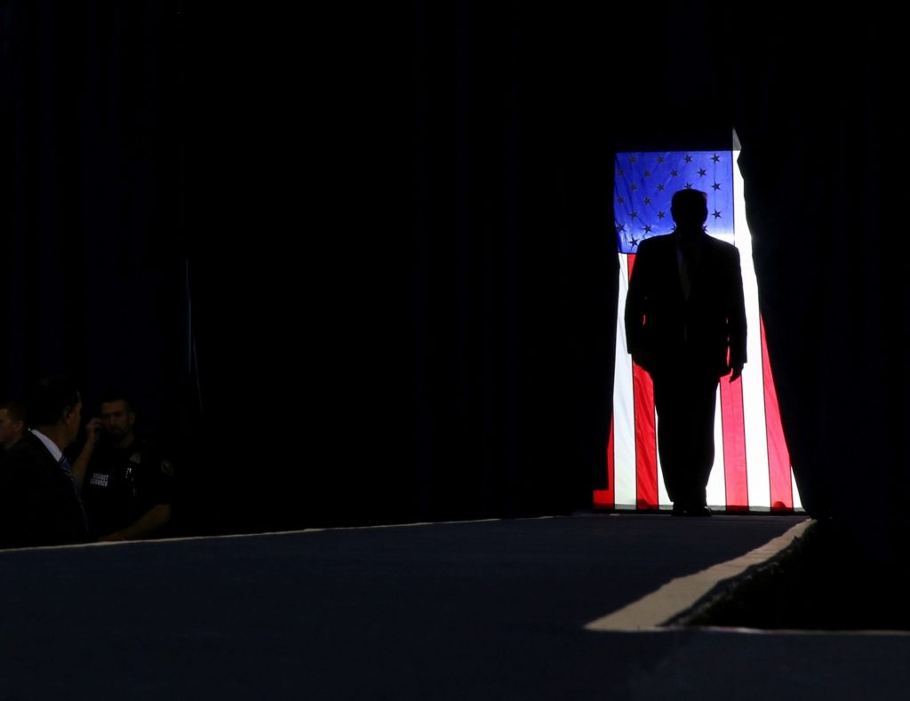Online threats and security measures increase ahead of Trump's indictment hearing.