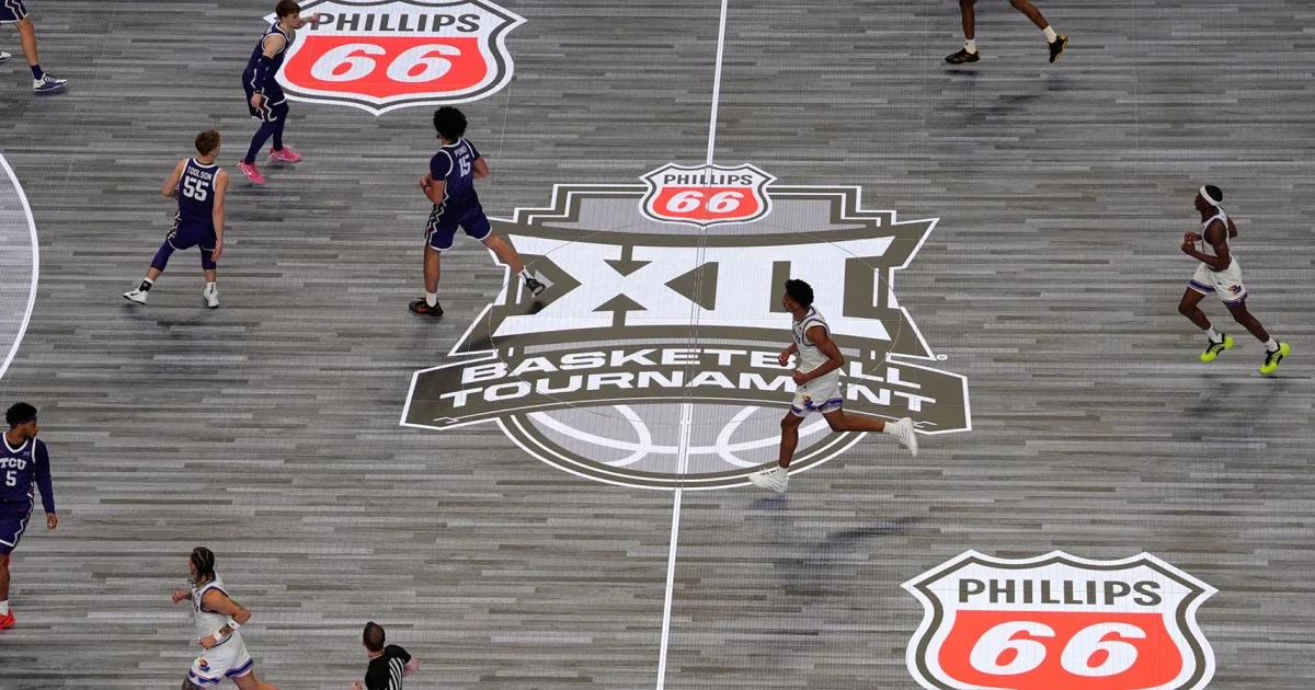 Big 12 switches back to hardwood for tourney finales after slippery glass floor issues