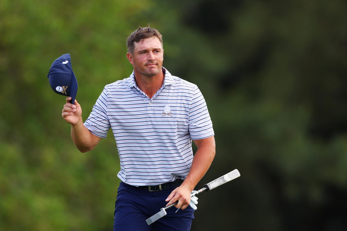 "2024 Masters: DeChambeau Leads Amid Windy Conditions and Property Dispute"