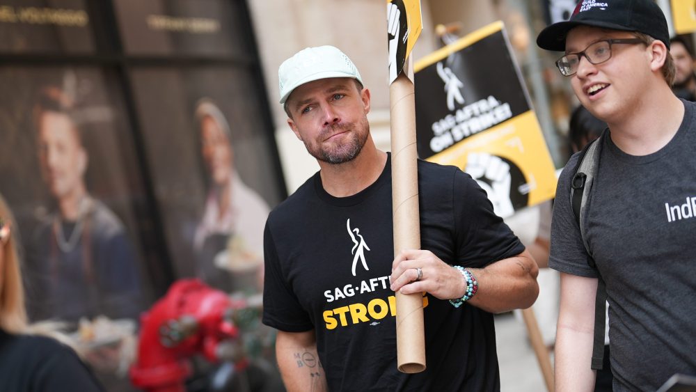 Featured image for Stephen Amell's Controversial Comments Lead to Picket Line Participation