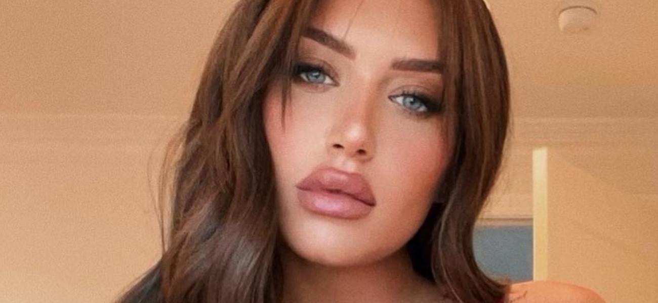 "Stassie Karanikolaou Soaks Up the Sun in String Bikini"