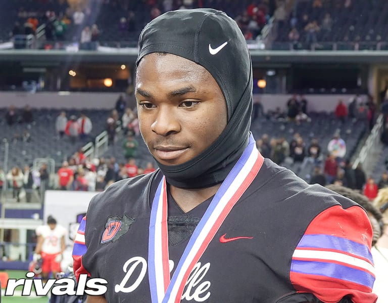 "The Intense Recruiting Battle and Betting Predictions for the Red River Rivalry Showdown"