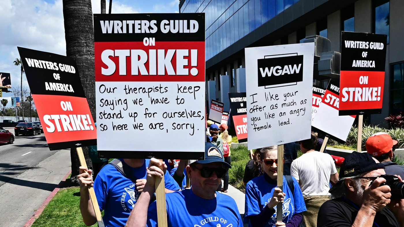 "2023 Writers' Strike Sparks Witty Protests and Revenue Concerns in Hollywood"