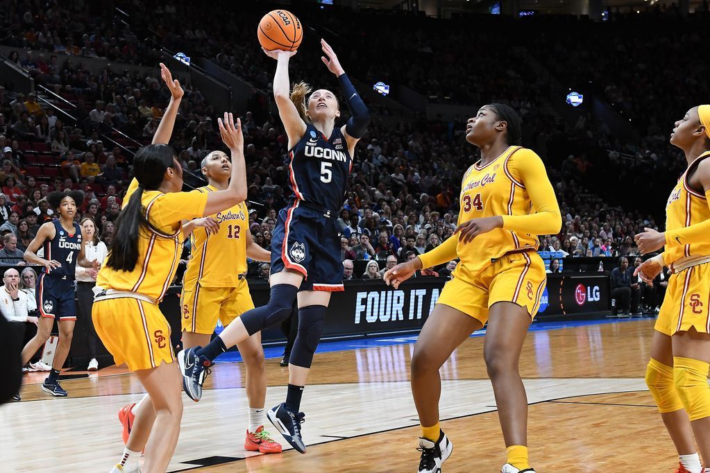 "UConn and Iowa Secure Final Four Spots in NCAA Women's Basketball Tournament"