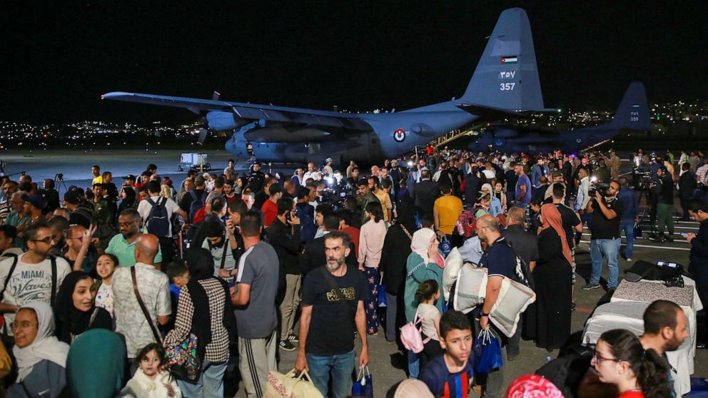 Foreigners flee as violence erupts in Sudan's power struggle.
