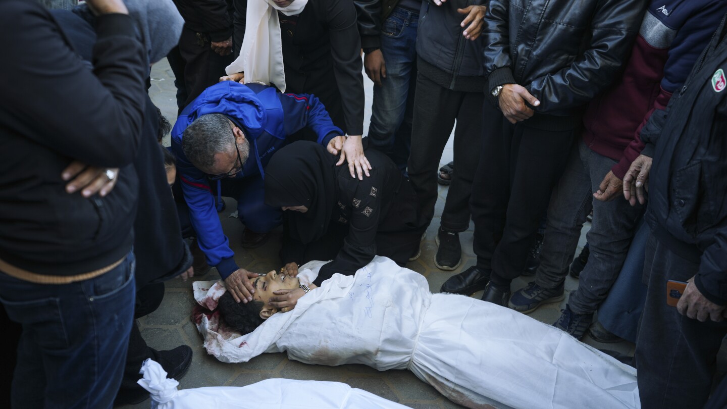 "Israeli Forces Kill Over 100 in Gaza Aid Convoy Attack"