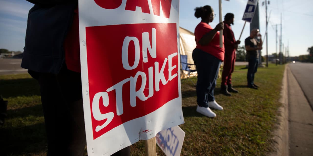 "Elon Musk Warns UAW Demands Could Devastate Auto Giants, Biden Joins Picket Line"