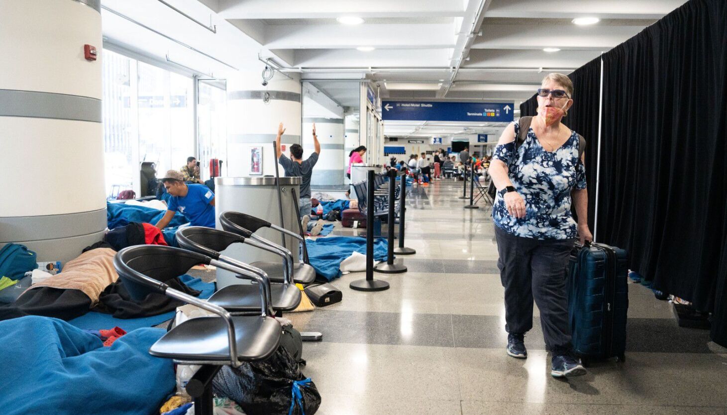 Migrants flown from Texas to Chicago face uncertain future at O'Hare Airport