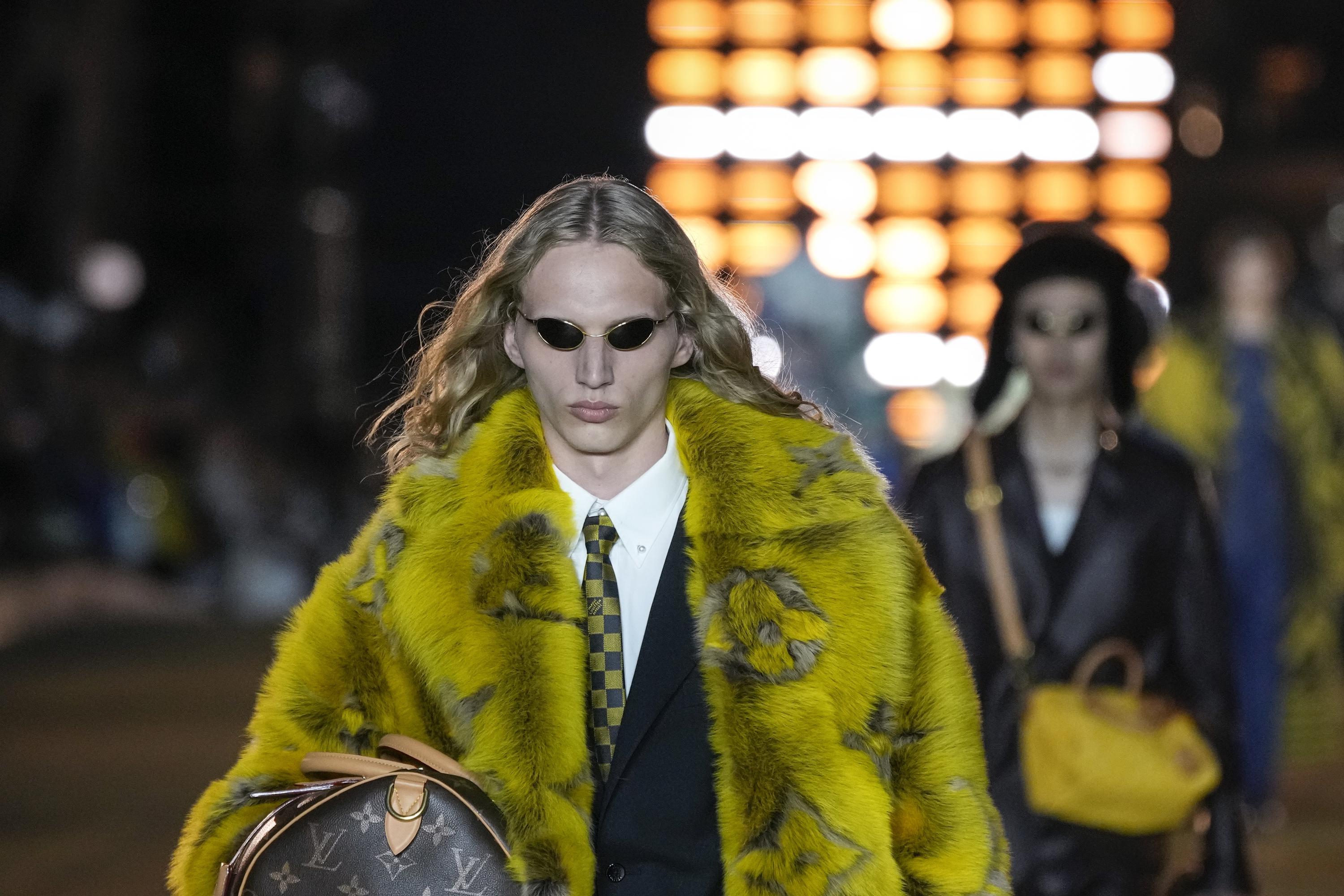 Pharrell's Louis Vuitton debut attracts A-listers in fashion and entertainment.