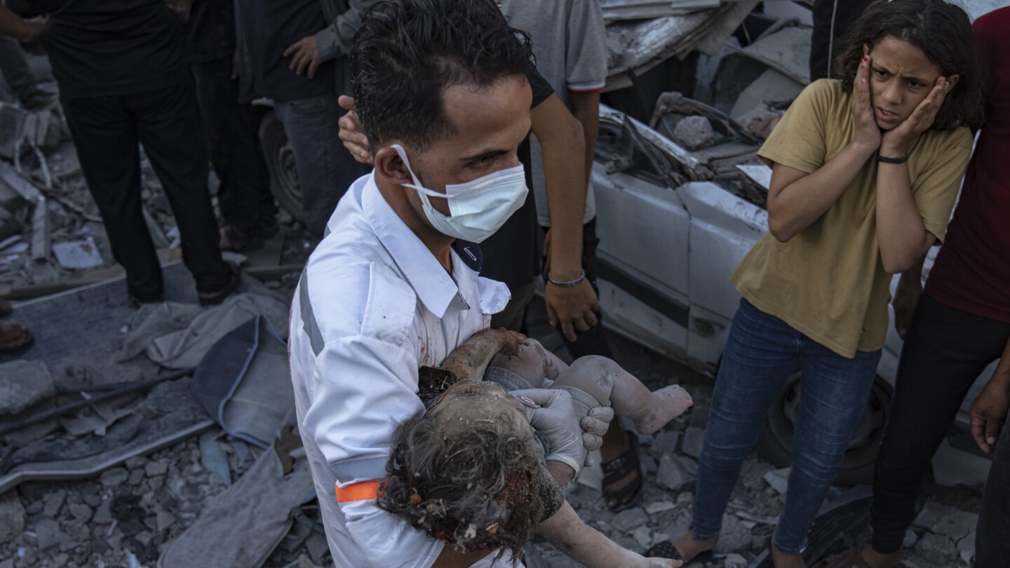 "Desperately needed aid trickles into besieged Gaza as Egypt's border crossing opens"
