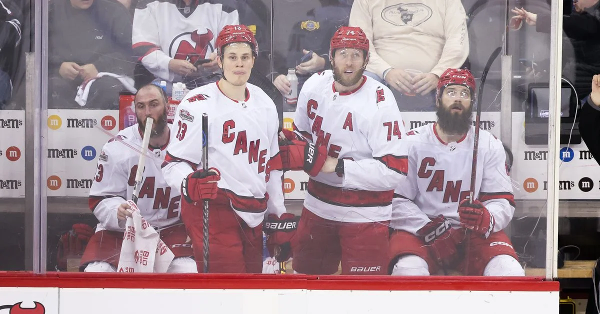 "Devils and Hurricanes Face Off in Crucial Game 4 of Playoffs"