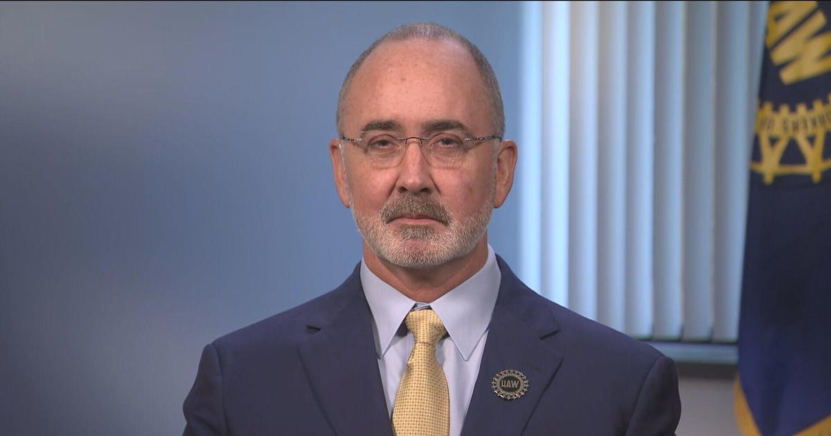 "UAW President Shawn Fain's Endorsement of Biden Sparks Controversy Over Trump and Abortion Rights"