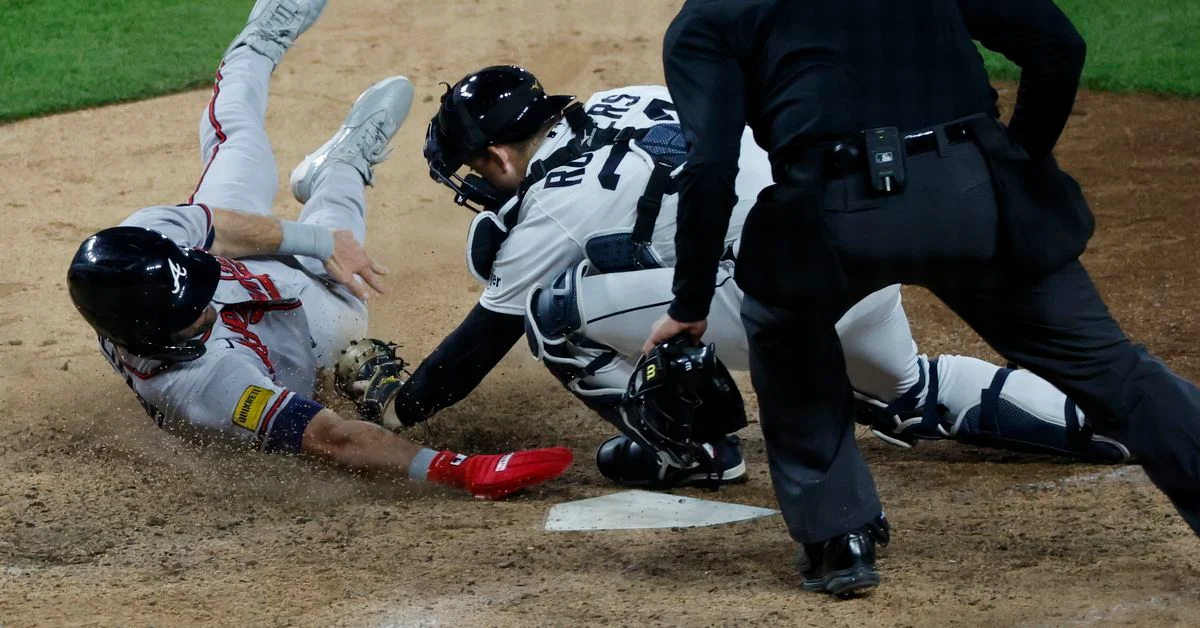 Braves' Ozuna Injured and Bullpen Struggles in Loss to Tigers.