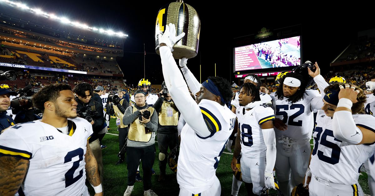 Featured image for "Michigan maintains top spot in college football rankings after impressive road victory"