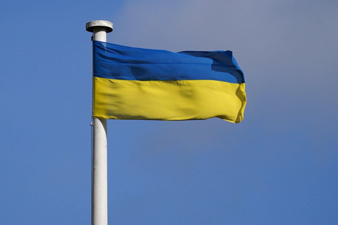 Ukrainian lawmaker punches Russian official over flag at conference.