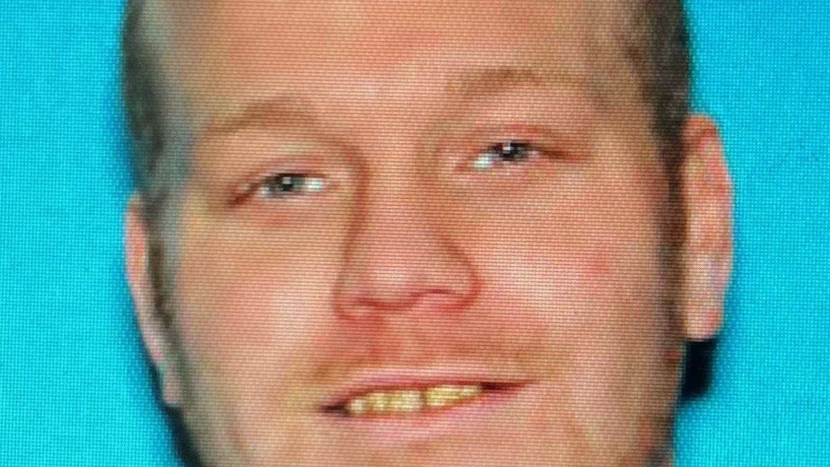 Featured image for "Manhunt for Suspect Who Struck Lansing Officer with Sedan"