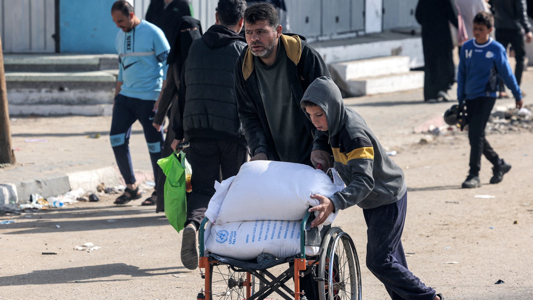 "Chaos as Israel Delivers Humanitarian Aid to Hungry Palestinians in Gaza"