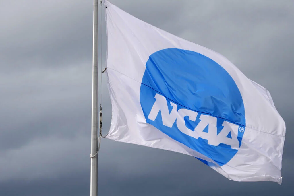 NCAA removes official visit limits for football recruits.