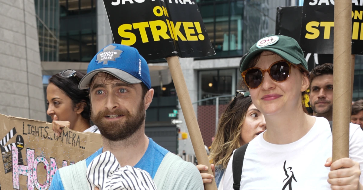 Featured image for Daniel Radcliffe and Erin Darke's Newborn Joins SAG-AFTRA Picket Line