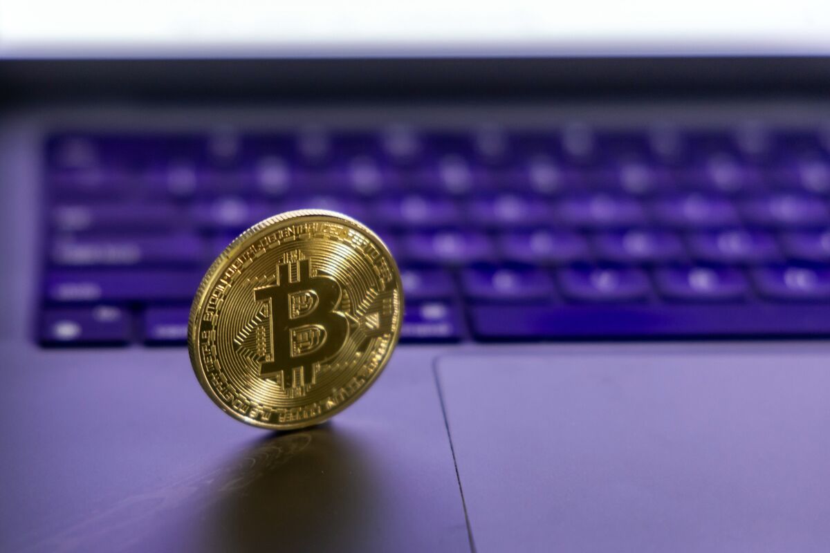 Bitcoin Dips Below $100K Amid Market Volatility