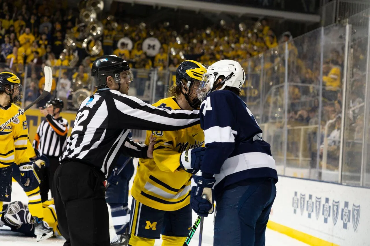 Michigan and Penn State battle for Frozen Four spot in NCAA hockey tournament.