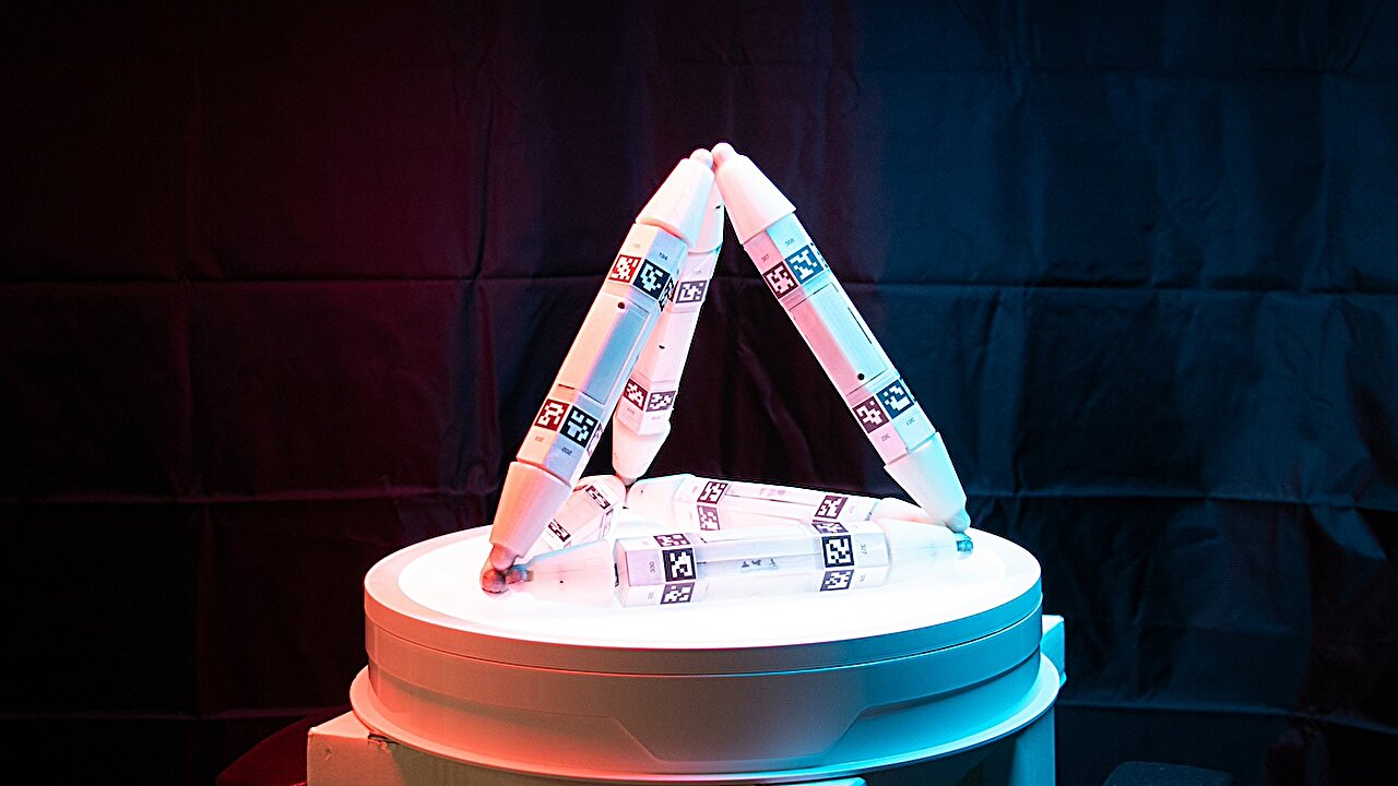 Featured image for Self-Repairing Robots Consume Parts from Others to Grow