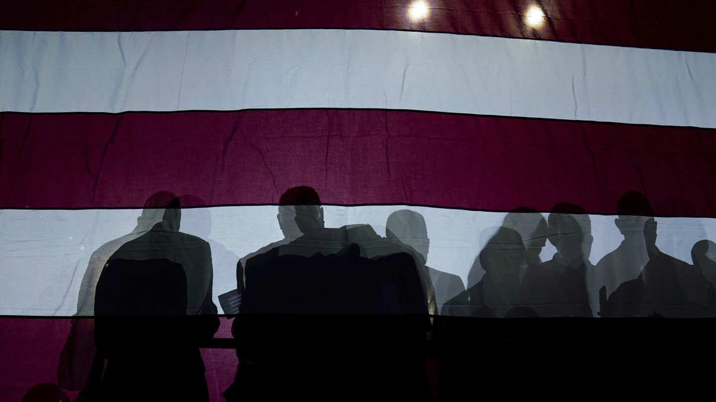 Featured image for "The Impact of Conspiracy Theories on American Politics and Society: Key Insights from the AP's Analysis"