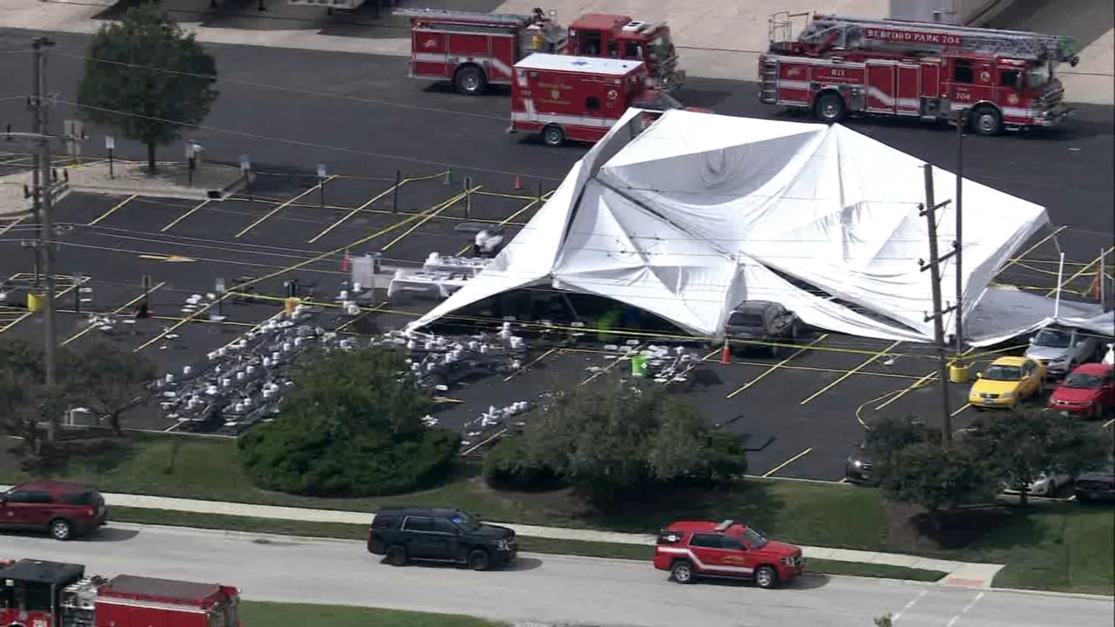Massive Tent Collapse in Bedford Park Leaves Dozens Injured, Some Seriously