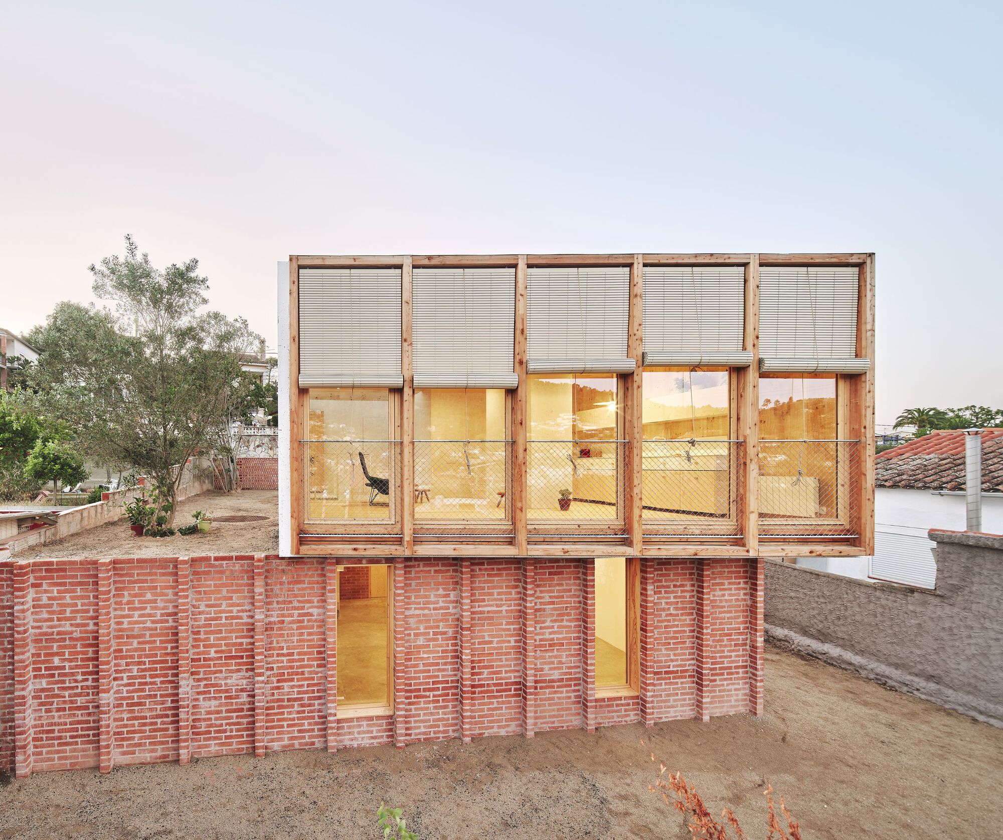 Featured image for Brick Base Elevates House Design