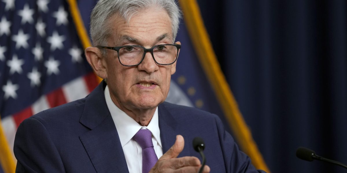 "Fed Signals Prolonged High Rates Amid Stubborn Inflation Concerns"