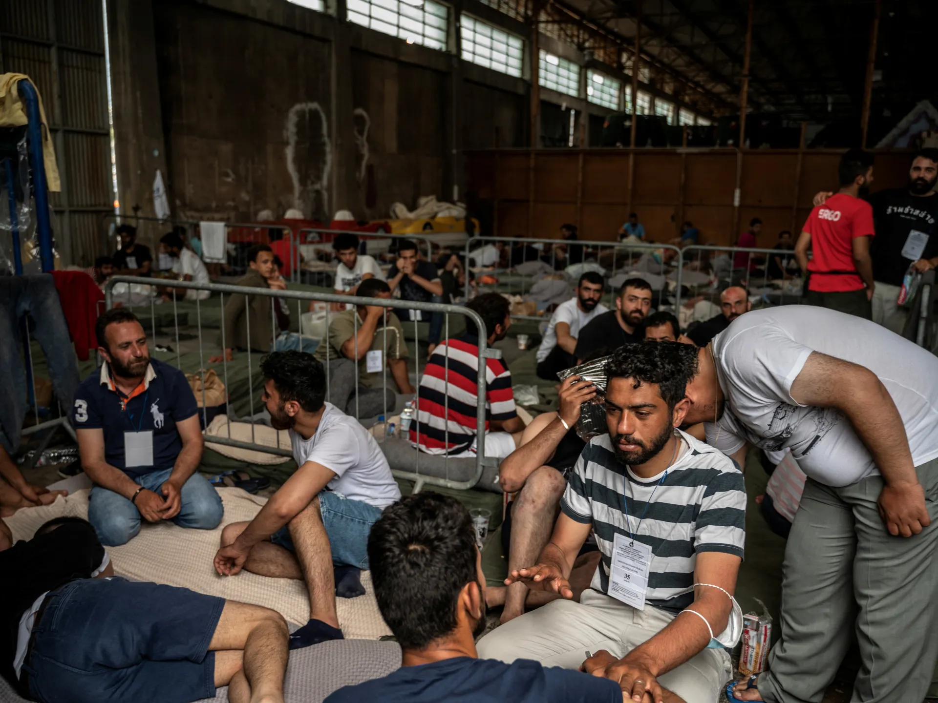 Surviving refugees arrested after shipwreck tragedy near Greece.
