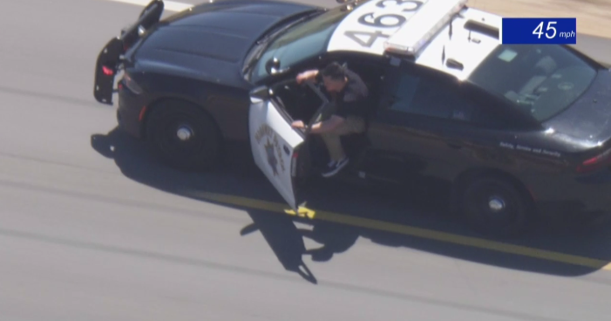 Stolen police cruiser pursuit ends in suspect's death.