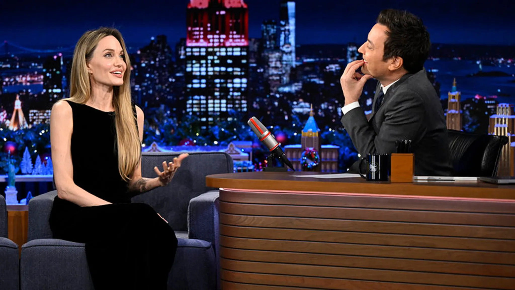 Featured image for Angelina Jolie's Quirky Late-Night Return: Barefoot and Candid