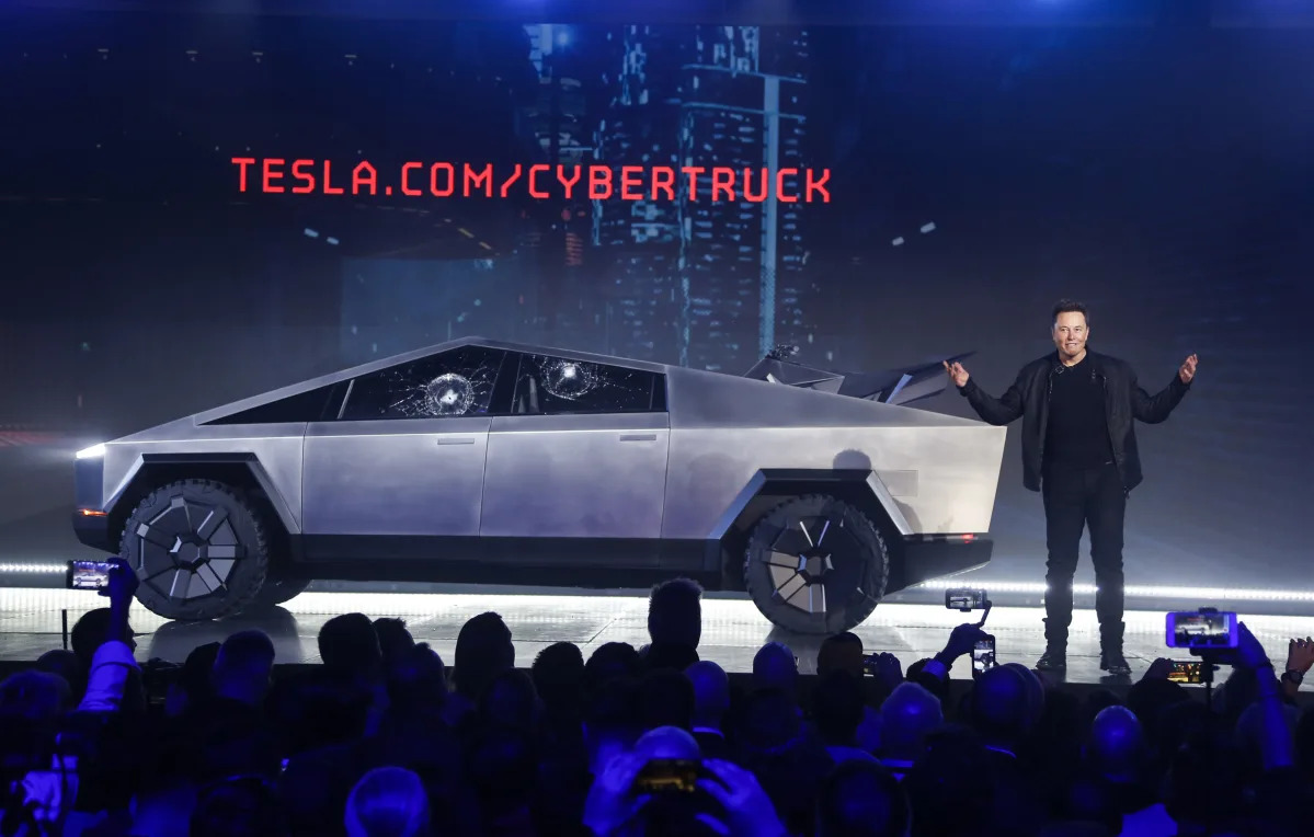 "Tesla Cybertruck: Stock Slides, Reviews Vary, and Musk's Determination"