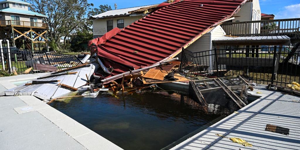 "Hurricane Idalia's Devastation: From Record Storm Surge to Widespread Flooding and Heavy Damage"