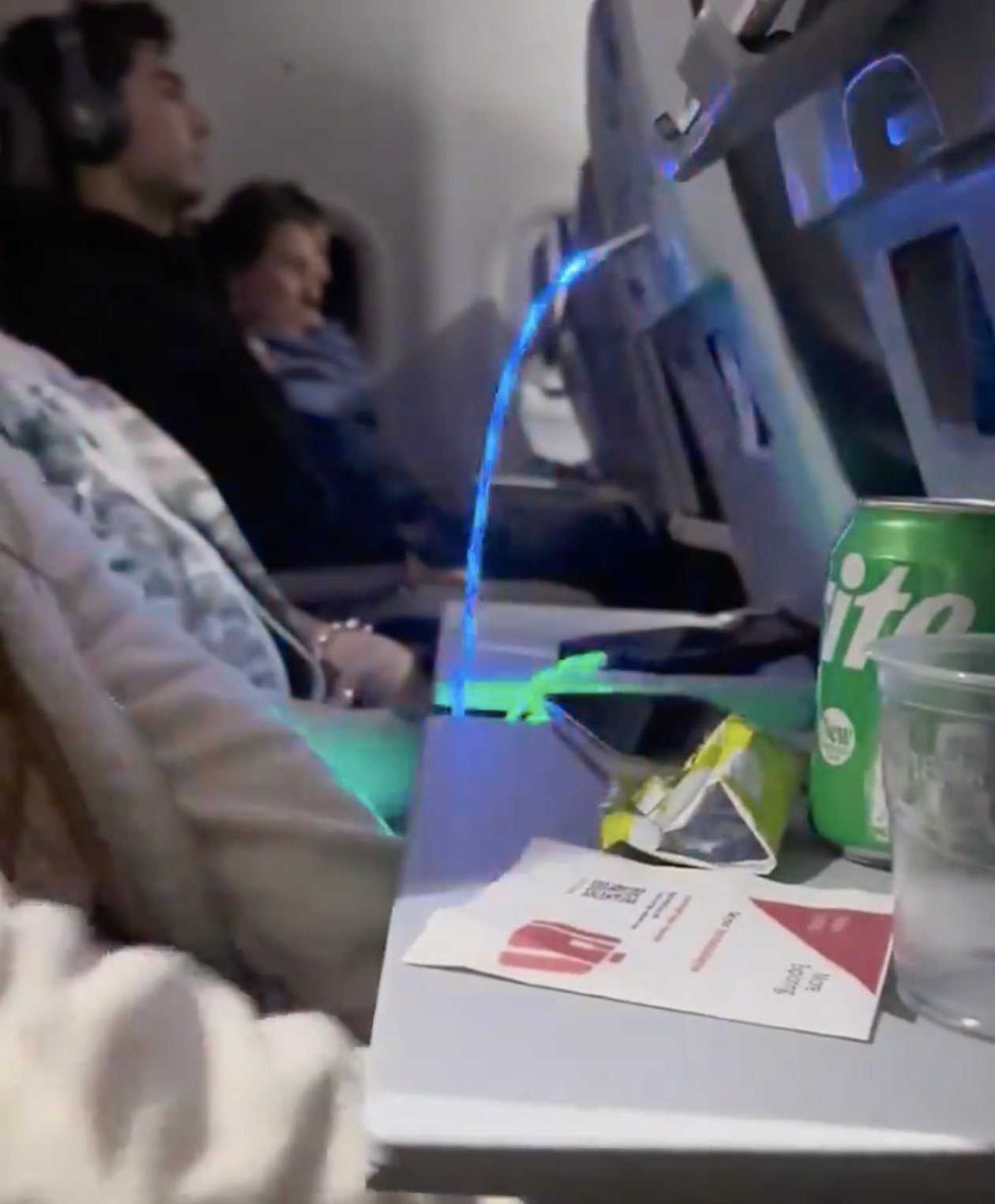 Featured image for "Outrage on Redeye Flight: Passenger's Flashing Charger Sparks Fury"
