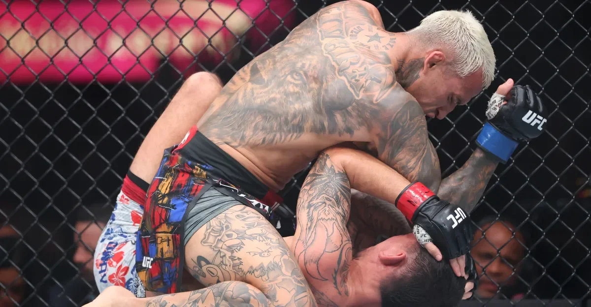 Oliveira dominates Holloway to claim UFC 326's BMF belt