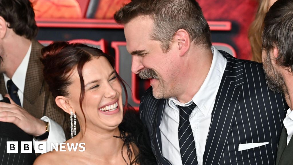 Featured image for Millie Bobby Brown and David Harbour Reunite at 'Stranger Things' Premiere Amid Rumors