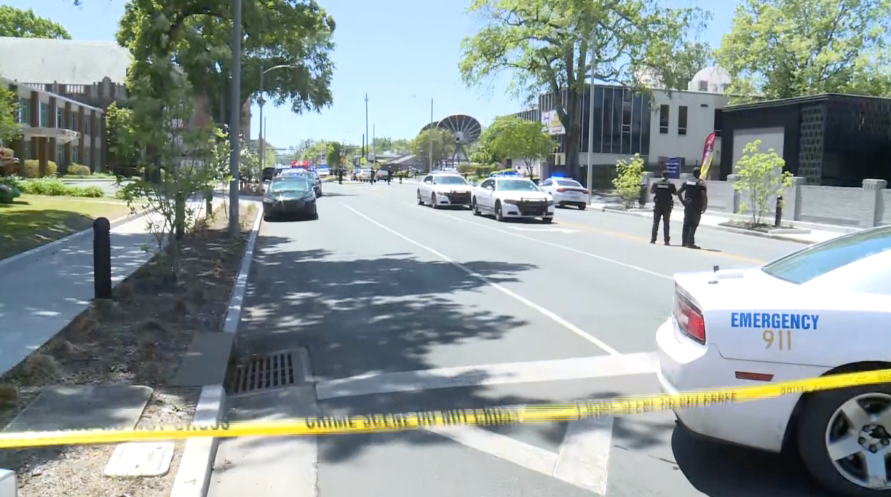 Memphis TV station targeted in shooting, suspect in custody.