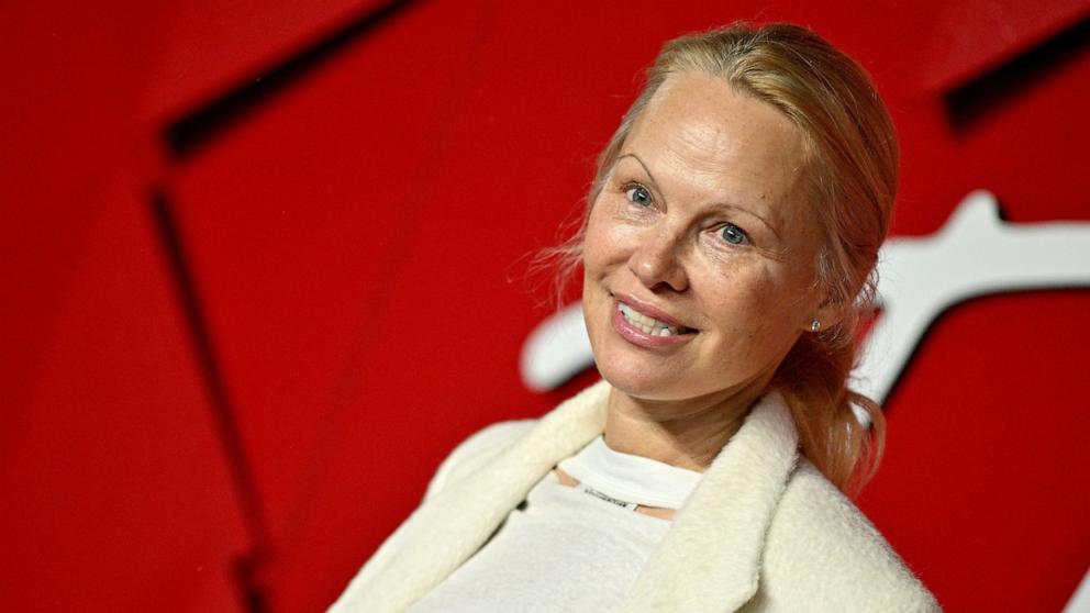 Featured image for "Pamela Anderson Embraces Natural Beauty at the 2023 Fashion Awards"