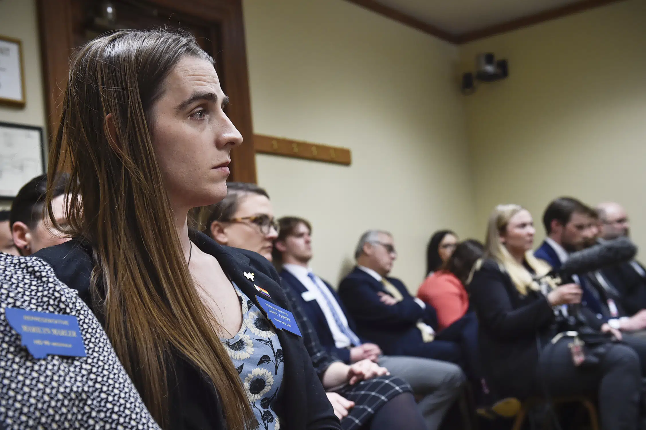 Trans Montana lawmaker faces ongoing silencing amidst protests.