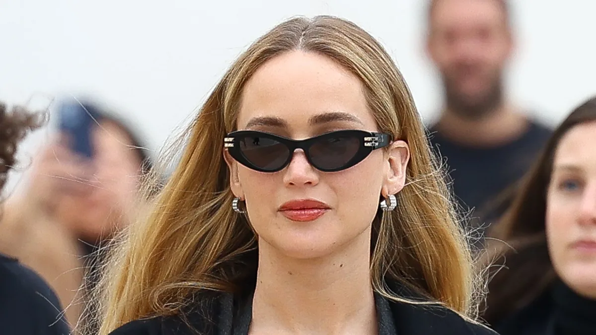"Jennifer Lawrence Stuns in Plunging 3-Piece Suit at Dior's Paris Fashion Week Show"