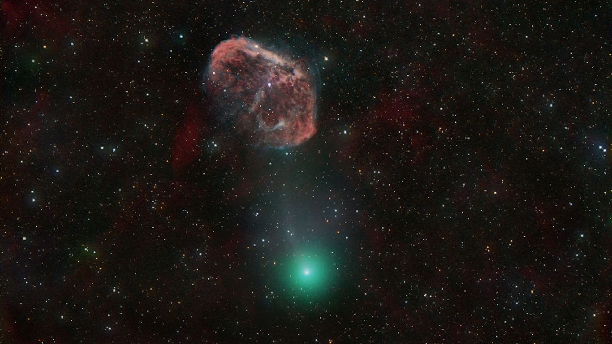 Featured image for "Green 'Devil Comet' Photobombs Nebula on Collision Course with Earth"