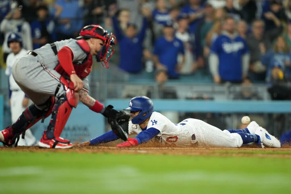 Dodgers outlast Twins in marathon game with walk-off win.