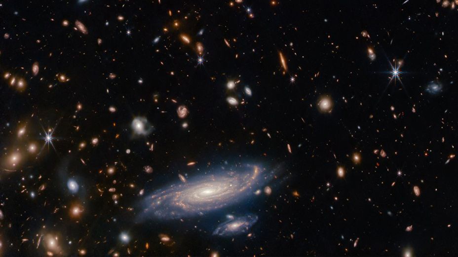 "James Webb Space Telescope Challenges Cosmic Rulebook: Early Galaxies Defy Expectations"