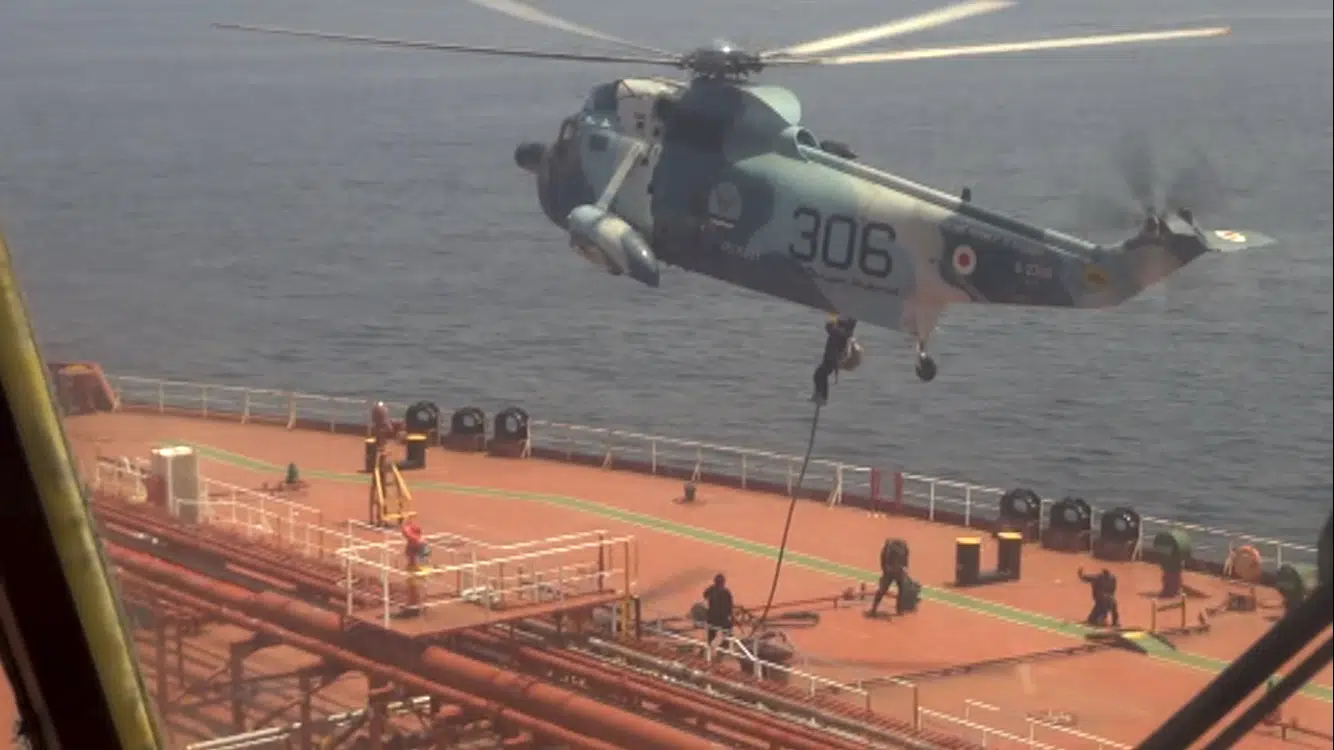 Iranian commandos capture US-bound tanker on TV.